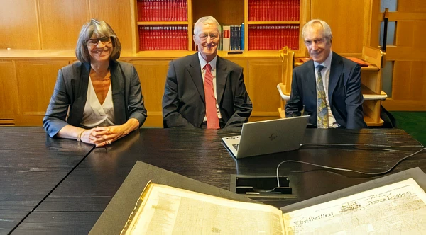 Secretary of State Hilary Benn views newly digitised historic editions of the News Letter during a visit to the British Library. Photo by the Northern Ireland Office.