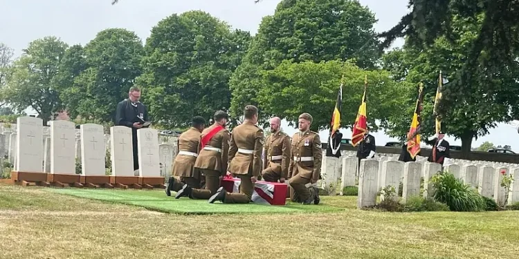 The bearer party, standard bearers, and Padre laying Private Birch and his comrades to rest. Photo by the MOD.