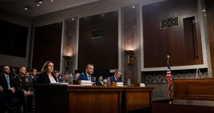 Defense Secretary Pete Hegseth, Air Force Gen. Dan Caine, and Bryn Woollacott MacDonnell Testifying. Photo by NPO A Kubitza.