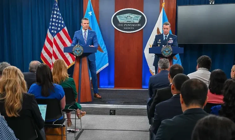 Defense Secretary Pete Hegseth and Air Force Gen. Dan Caine, chairman of the Joint Chiefs of Staff, conduct a press briefing at the Pentagon, June 26, 2025. Photo by K Basharat.