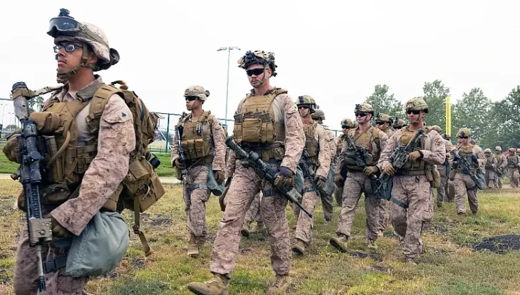 Marines assigned to guard federal workers and property gather in the greater Los Angeles area, June 10, 2025. Photo by Sgt. Godfrey Ampong.