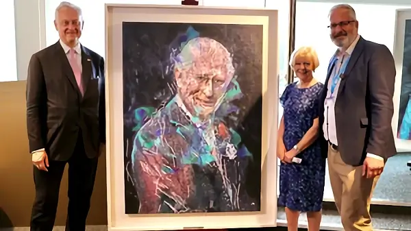 Ai Da Robot painting of His Majesty King Charles III. Photo by UK Mission to the WTO.