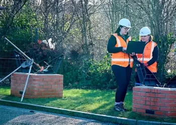 Dr Fiona Todd and colleague, collecting data at the Gateshead Mine Water Heat Living Lab. Photo by the Mining Remediation Authority.