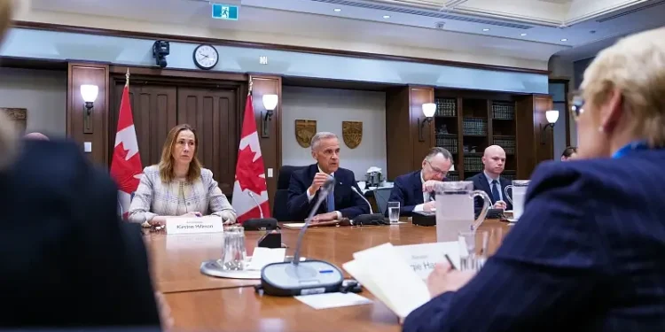 Mark Carney talking to the US Senators. Photo by the PMs Office.