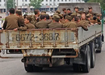 North Korean troops being transported by truck. Photo by Roman Harak.
