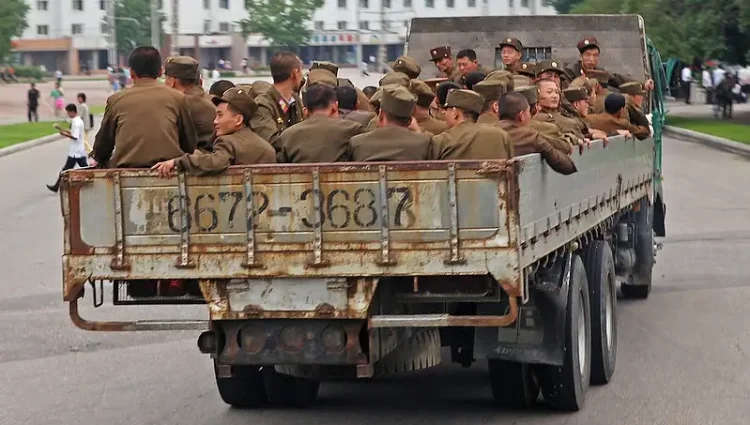 North Korean troops being transported by truck. Photo by Roman Harak.