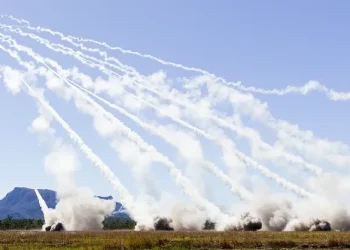 Rockets streak into the air from six M142 High Mobility Artillery Rocket Systems during a combined live-fire portion of Exercise Talisman Sabre 25 in Australia, July 14, 2025. Photo by Keeler.