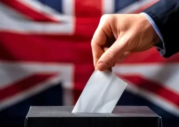 Young person voting in a UK election. Photo by the Ministry of Housing, Communities and Local Government. **stock-politics**