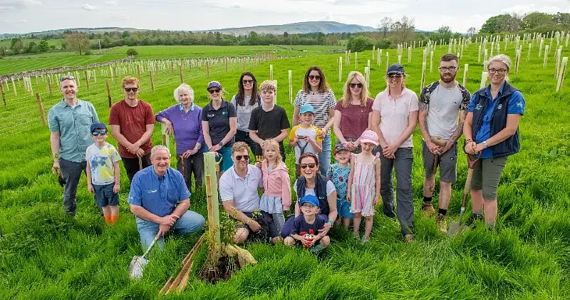 A group photo from one of the community planting days at Paragon’s Townhead Woods. Photo by IntroPR.