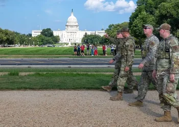 Airmen assigned to the D.C. Safe and Beautiful Task Force patrol in front of the U.S. Capitol in Washington, Aug. 16, 2025. The task force of 800 National Guard. Photo by Sgt Spraktes.