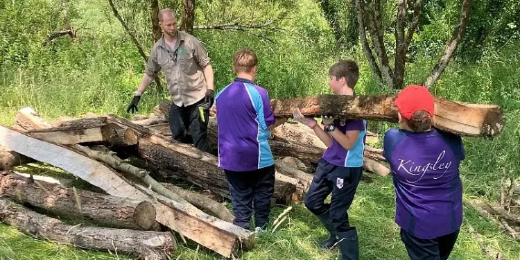 Kingsley School students helping build the otter habitat with the Environment Agency and Kier. Photo by the Environment Agency.