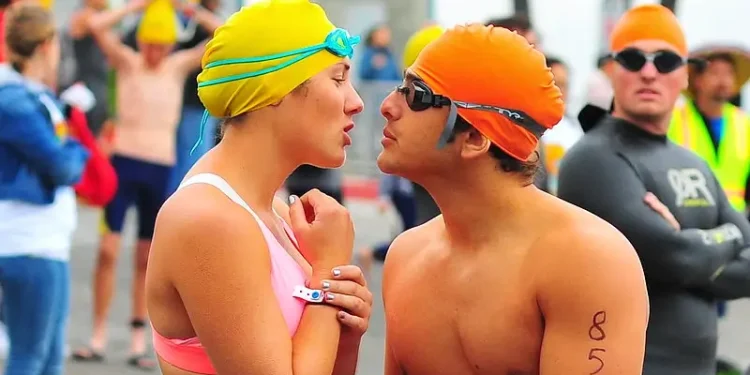 Pre Swim Kiss. Photo by Chris Hunkeler.