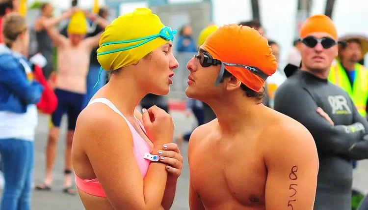 Pre Swim Kiss. Photo by Chris Hunkeler.