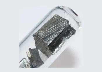 Ultrapure neodymium under argon, 5 grams. Photo by Hi-Res Images of Chemical Elements.