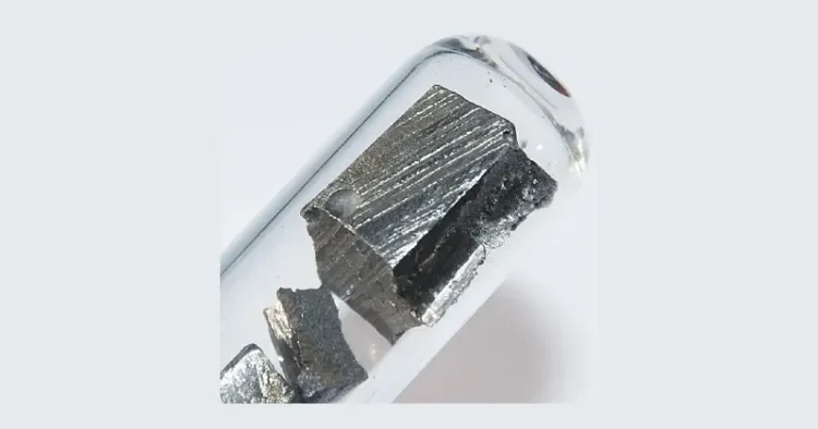 Ultrapure neodymium under argon, 5 grams. Photo by Hi-Res Images of Chemical Elements.
