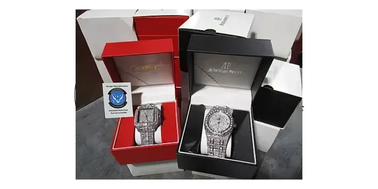 Cartier Moncler and Rolex seized. Photo by CBP.