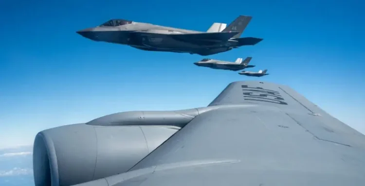 Three Air Force F-35A Lightning IIs, assigned to the 356th Expeditionary Fighter Squadron, fly in formation before aerial refueling over the Pacific Ocean, Dec. 11, 2025. Photo by air force Bermudez.