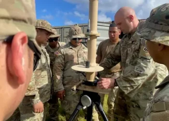Army Chief Warrant Officer 3 Grant Borden at Fort Sill, Okla., instructs how to set up a fixed site-low, slow, small unmanned aircraft system integrated defeat system. Photo by Capt. Lajun