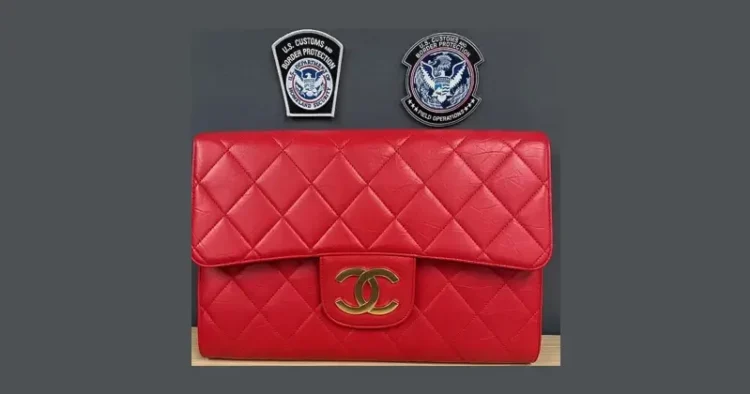 CBP officers in Pittsburgh seized counterfeit designer handbags, jewelry, and scarves seized from a shipment originating in China. Photo by the CBP