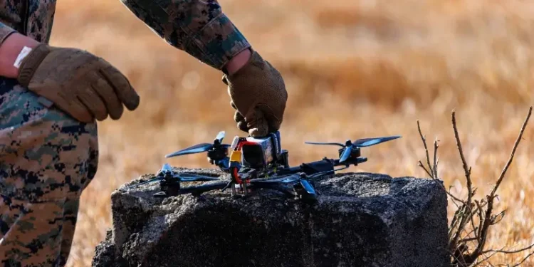 Marine sets up a counter-unmanned aerial system -a clay pigeon drone. Photo by Lance Corp. Melendez.