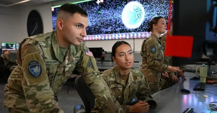 Space Force Spc. Roberto Santiago-Irizarry, and 2nd Lt. Yoon Jung Lee monitor Space Domain Awareness information at Vandenberg Space Force Base, Calif., Oct. 4, 2024. Photo by Cadet Dozoretz.
