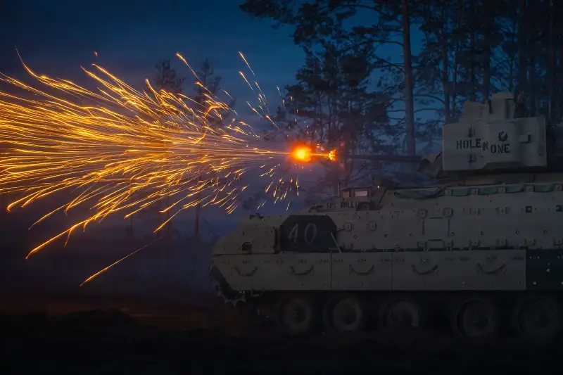 An Army M2A3 Bradley infantry fighting vehicle engages with an unmanned aerial system during Project Flytrap at Pabradė Training Area, Lithuania, May 10, 2026. Photo by Army Sgt. M. Elliott.