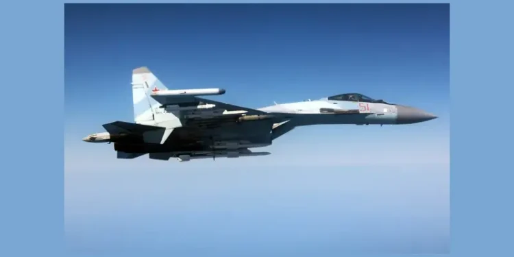 Russian jet dangerously intercepting a British Rivet Joint aircraft. Photo by the MOD. Crown Copyright.