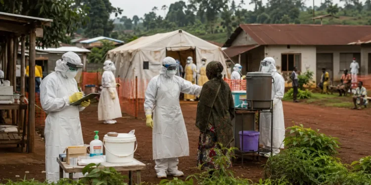 Health workers in protective equipment support Ebola screening and treatment operations in eastern DRC.