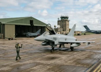 AI-generated photograph-style image of RAF combat and transport aircraft operating from a UK airbase.